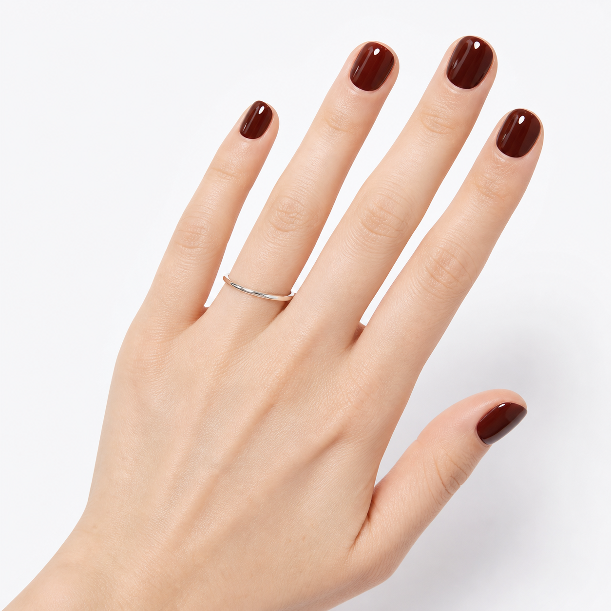 Bordeaux Velvet press-on nails worn on hand